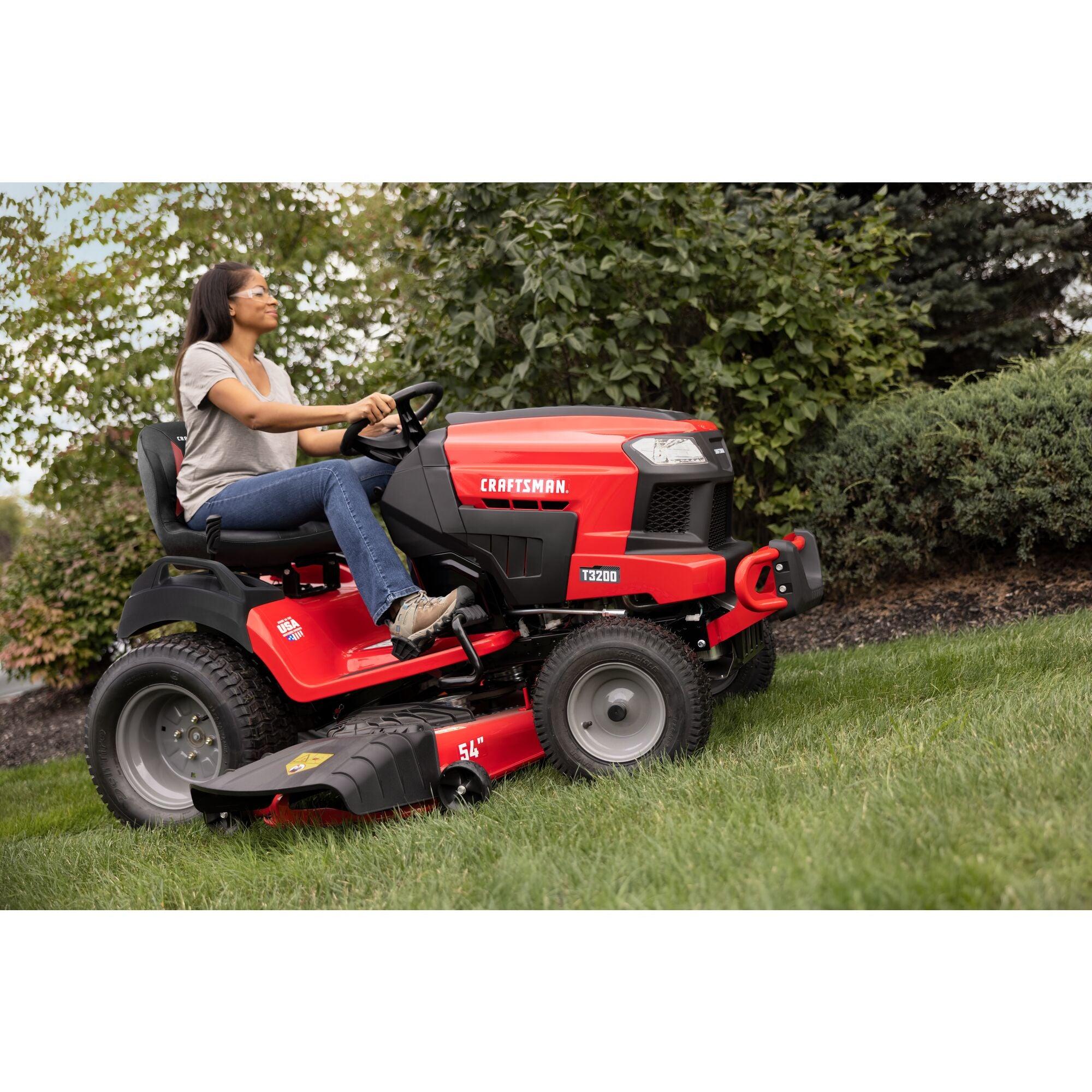 Homeowner mowing a large lawn with the CRAFTSMAN T3200
